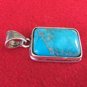 Turquoise stone with silver